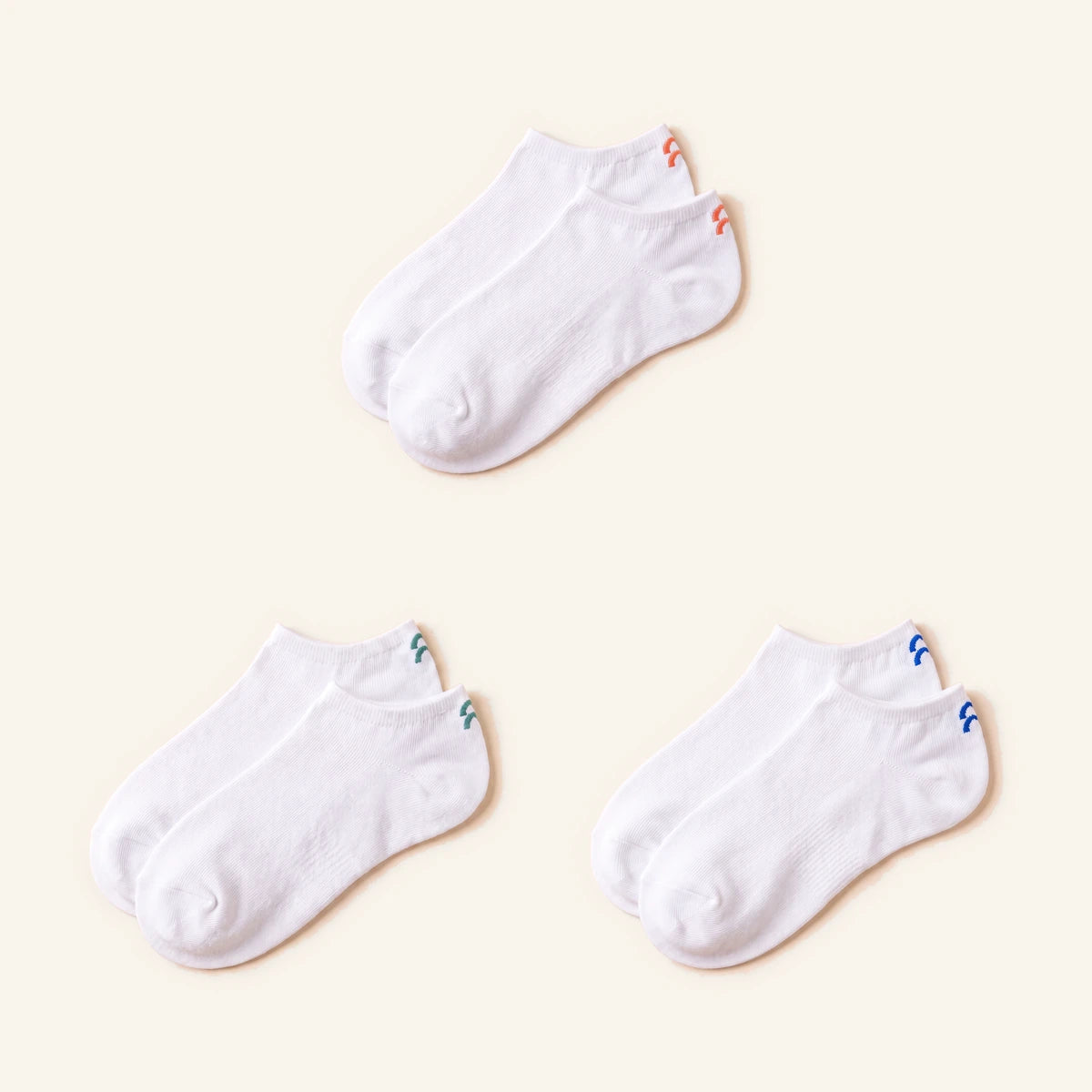 Sokken voor drie personen, ieder een eigen tagkleur